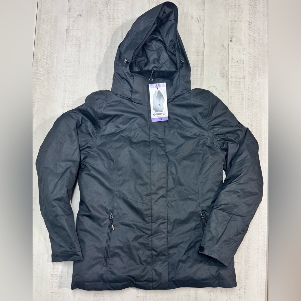 Gerry ladies snow ski black hooded jacket with front zipper pockets.